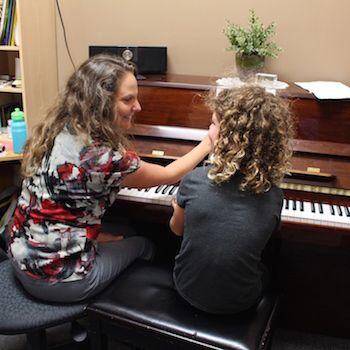 Piano student taking a Piano Lesson with Lora Wentworth