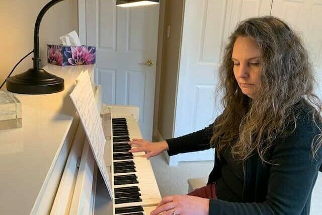 Piano teacher practicing Piano