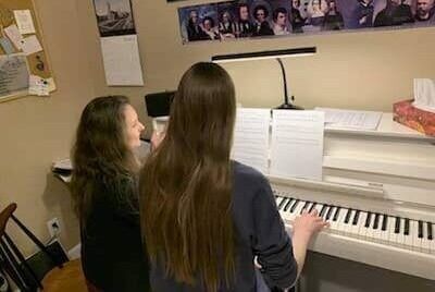 Piano teacher teaching Piano
