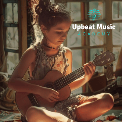 Girl playing the ukulele 
