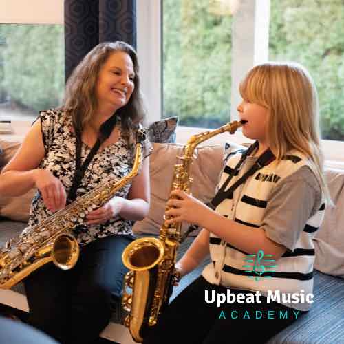 Saxophone Lessons Kelowna A young student taking Saxophone Lessons at the Upbeat Music Academy in Kelowna with Lora Wentworth